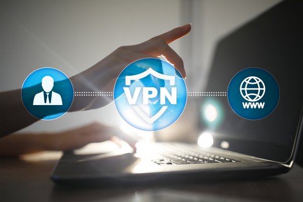 hand typing laptop vpn internet vpn services ivpn